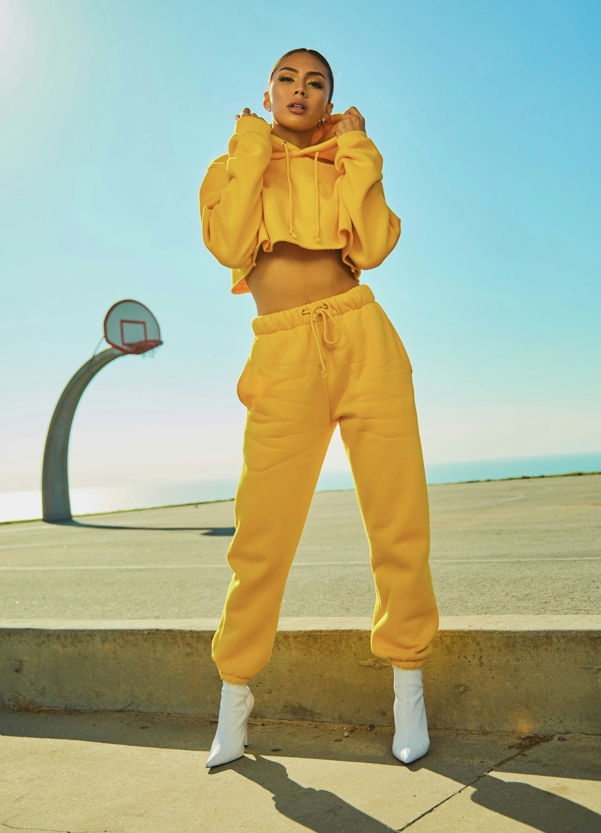 Feminine-presenting editorial styling